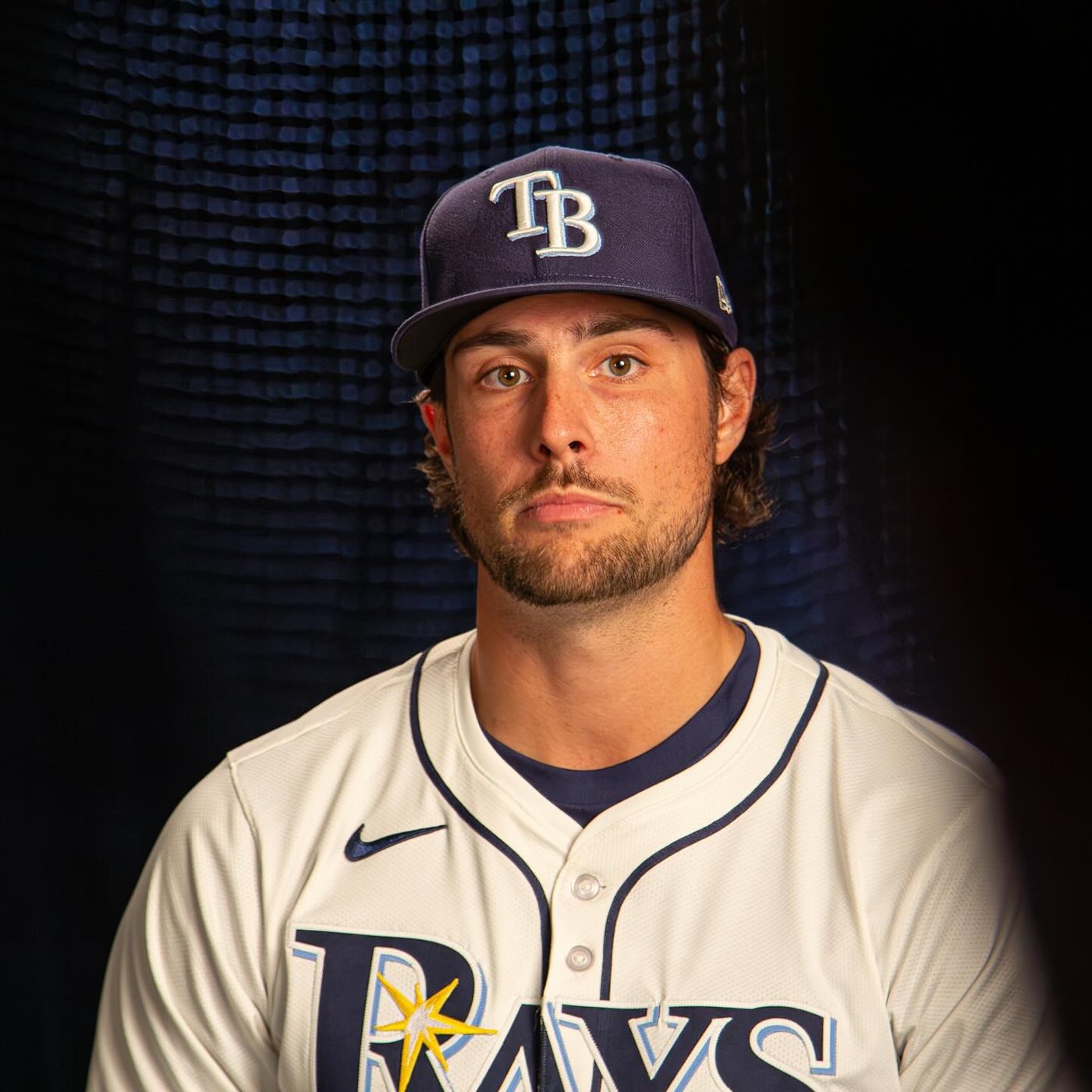 A Tampa Bay Rays player in a studio portrait