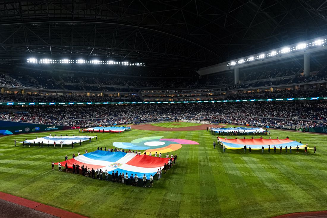 Giant national flags across the outfield at loanDepot park before a World Baseball Classic game