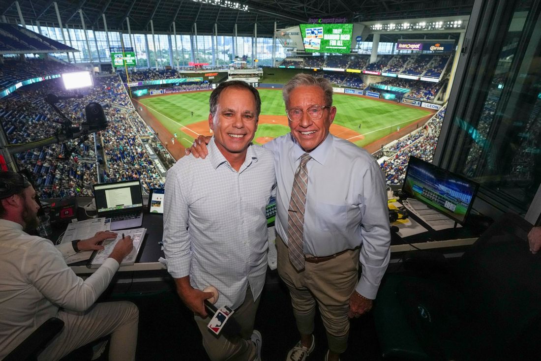 Tommy Hutton and his broadcast partner in the booth at loanDepot park
