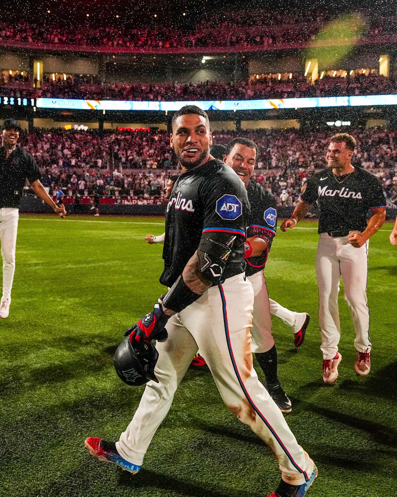 Marlins players celebrating a walk-off win