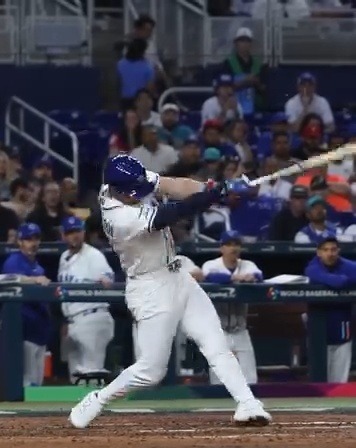 A Team Israel hitter swinging at loanDepot park