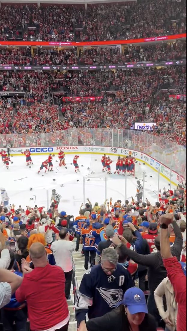 Florida Panthers players pour onto the ice as the arena erupts after winning the Stanley Cup