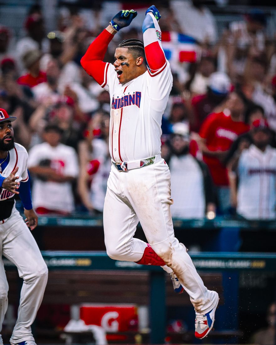 Juan Soto leaping in celebration for the Dominican Republic
