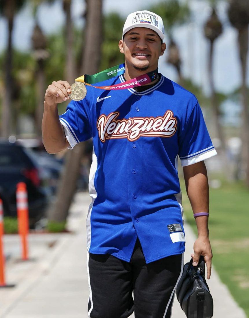 Javier Sanoja arriving at camp with his World Baseball Classic champion’s medal