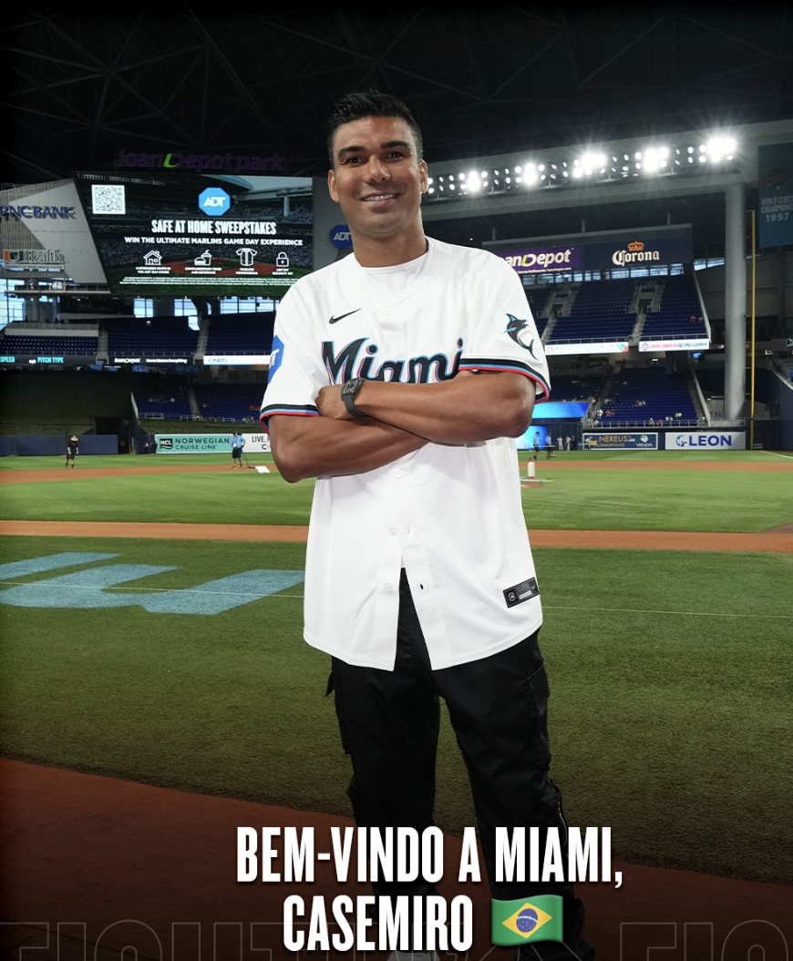 Casemiro in a white Miami jersey with arms crossed on the field at loanDepot park