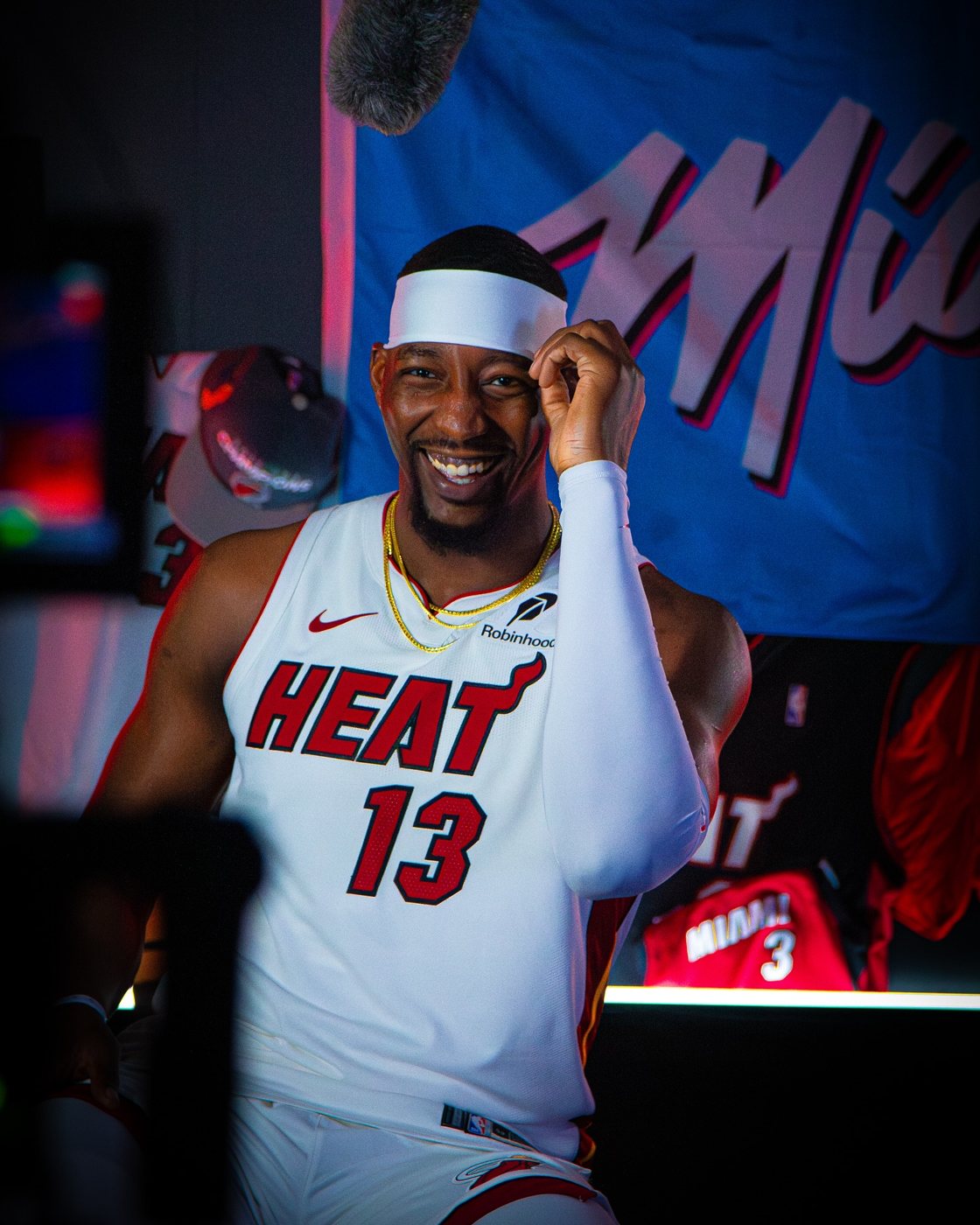Bam Adebayo grinning in his number 13 Heat jersey